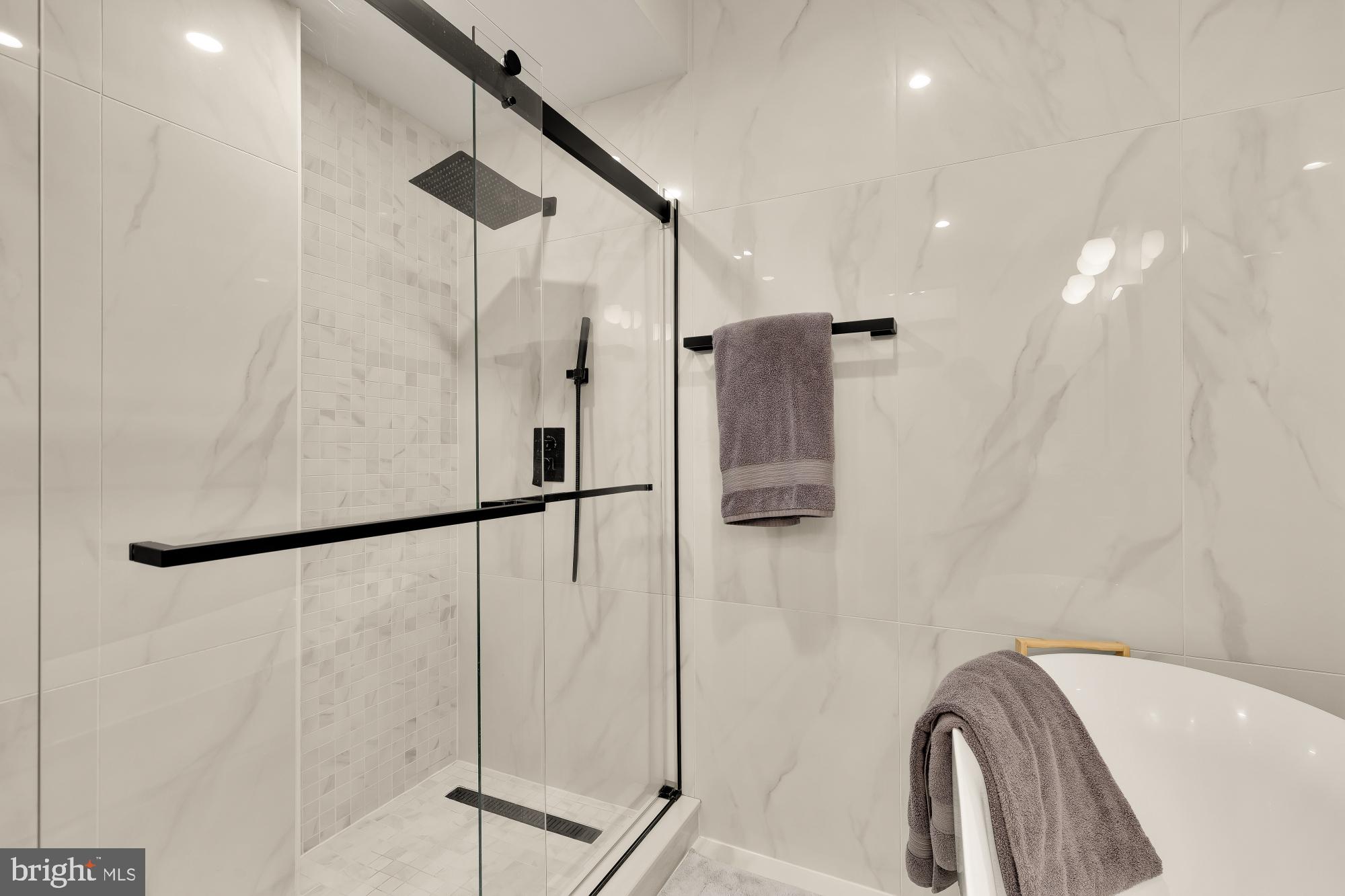 3361 18th Street Northwest Washington, DC 20010 - Photo 23 of 49 a bathroom with a shower and a sink