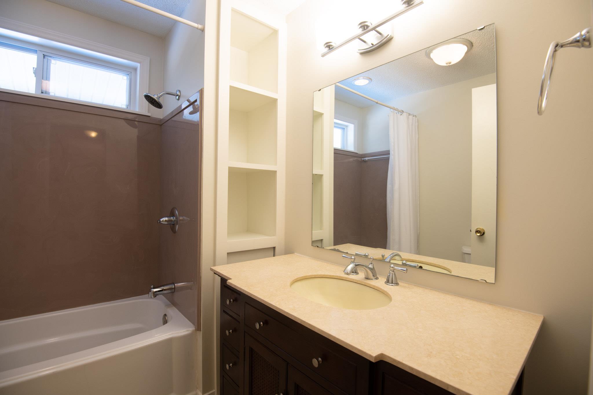 401 Lake Hills Road Tullahoma, TN 37388 - Photo 17 of 30 Guest hall bathroom with updated vanity and combination tub/shower