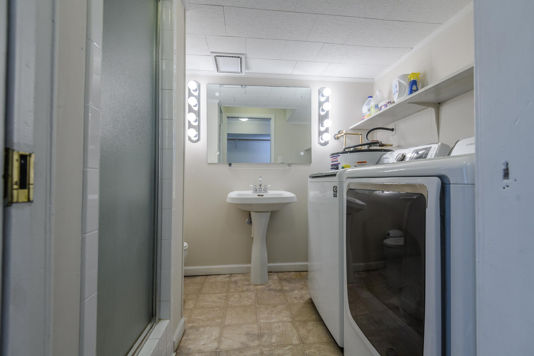 401 Lake Hills Road Tullahoma, TN 37388 - Photo 22 of 30 Utility room with full bath including a walk in shower