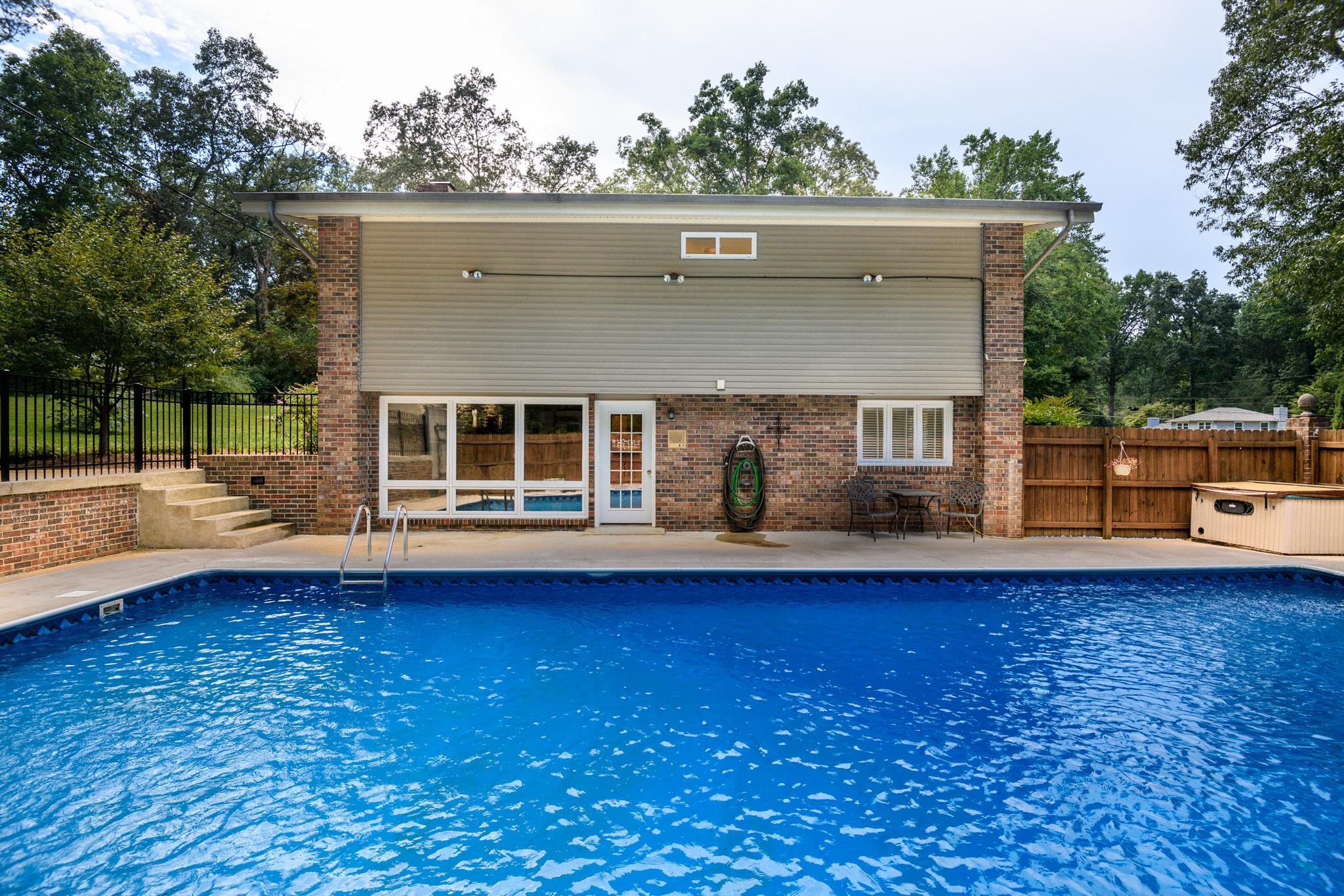 401 Lake Hills Road Tullahoma, TN 37388 - Photo 29 of 30 Pool house with bar stool area and electricity