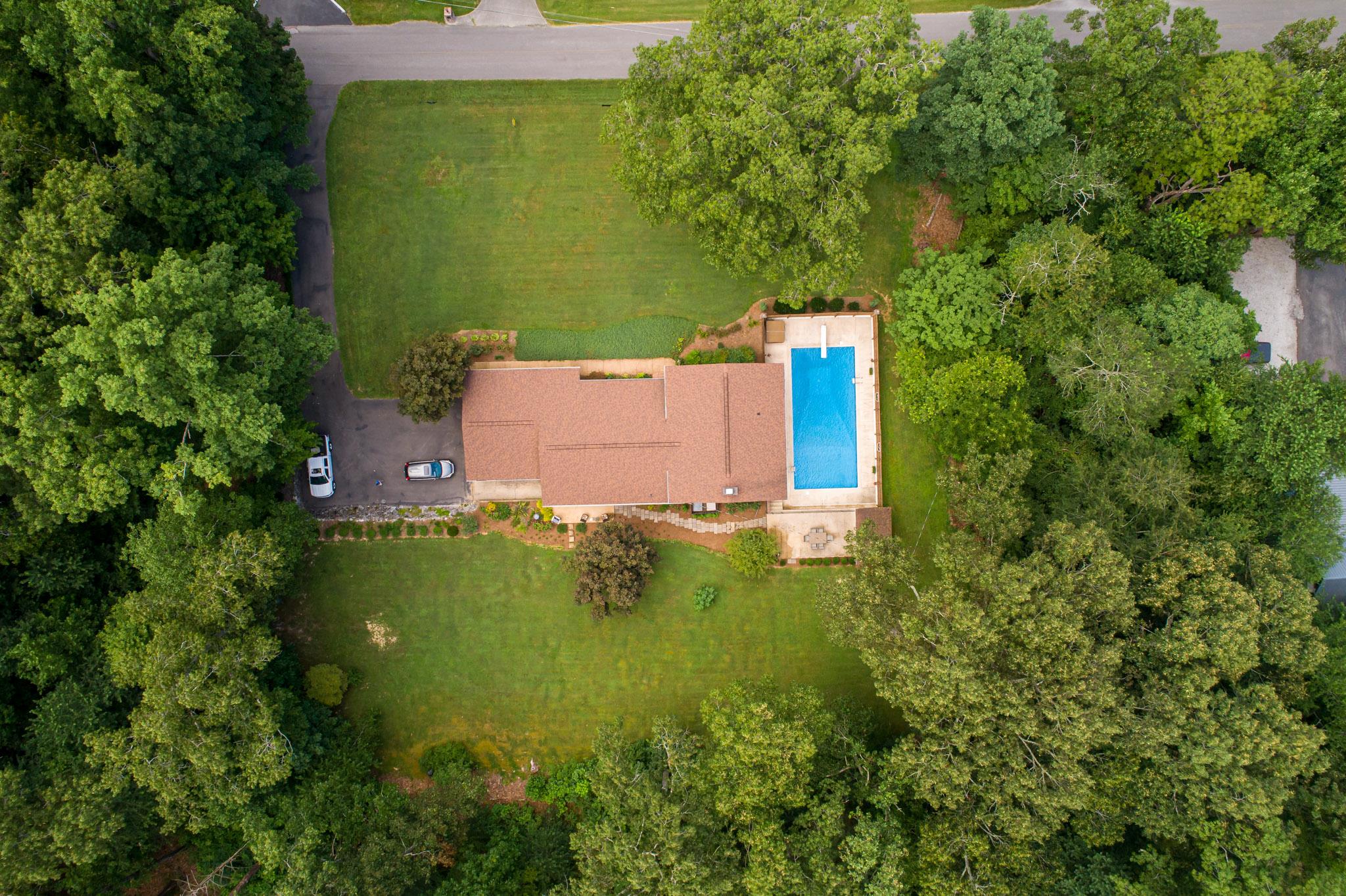 Another view of the private setting that includes the wooded areas on both sides