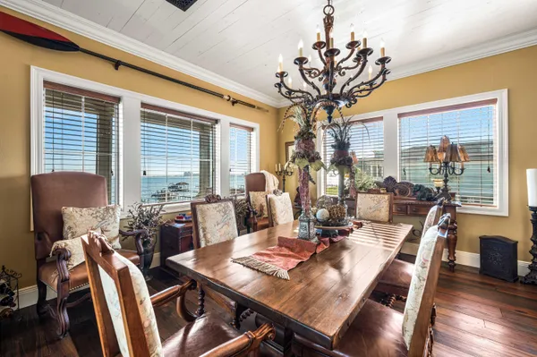 an aerial view of a house with a ocean view