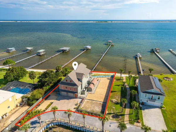 a view of swimming pool with outdoor seating