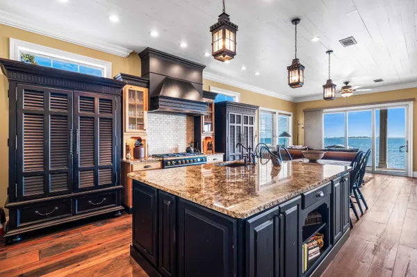 a front view of a fireplace with wooden floor
