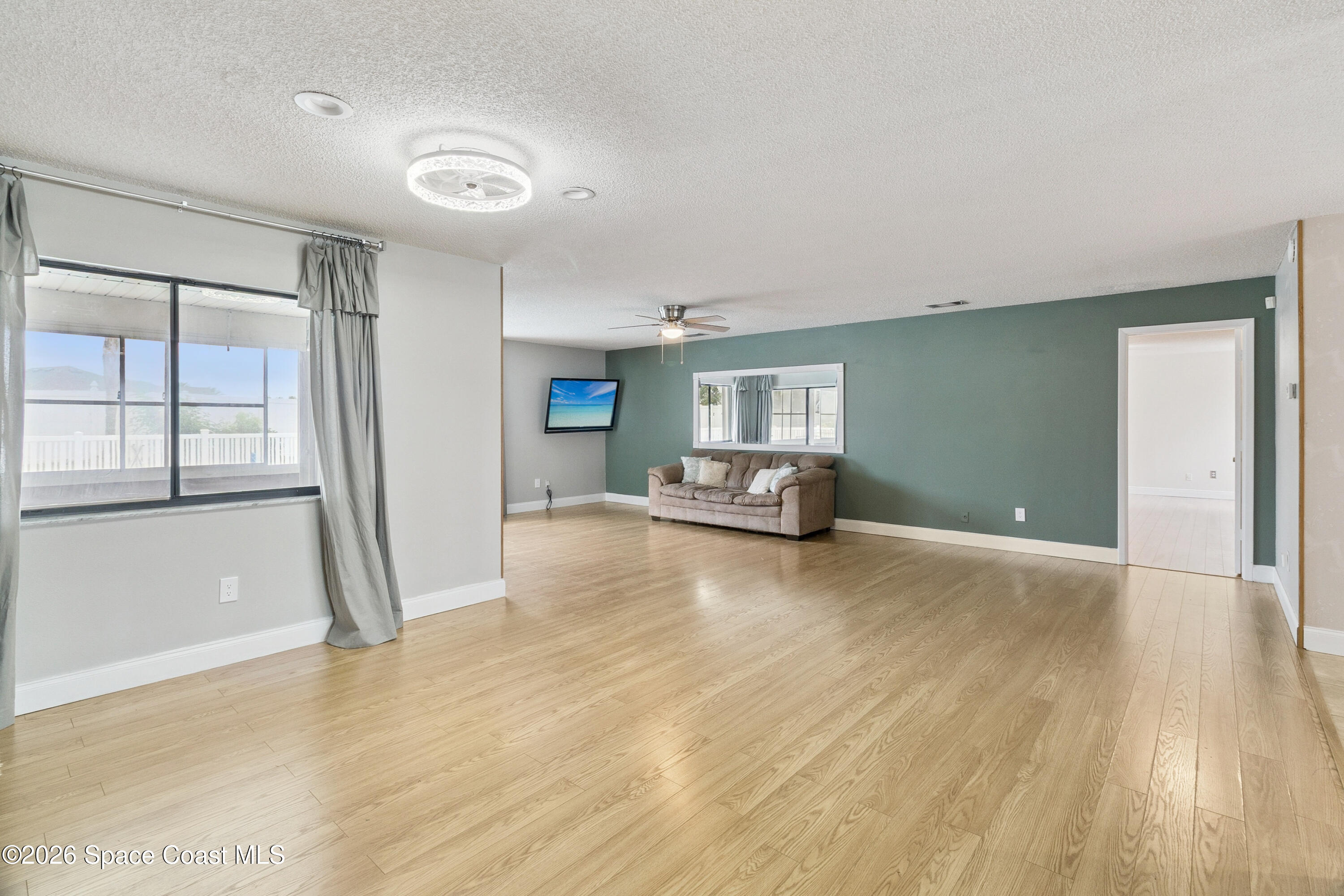 1334 Cherry Hills Road Northeast Palm Bay, FL 32905 - Photo 7 of 58 Living Room
