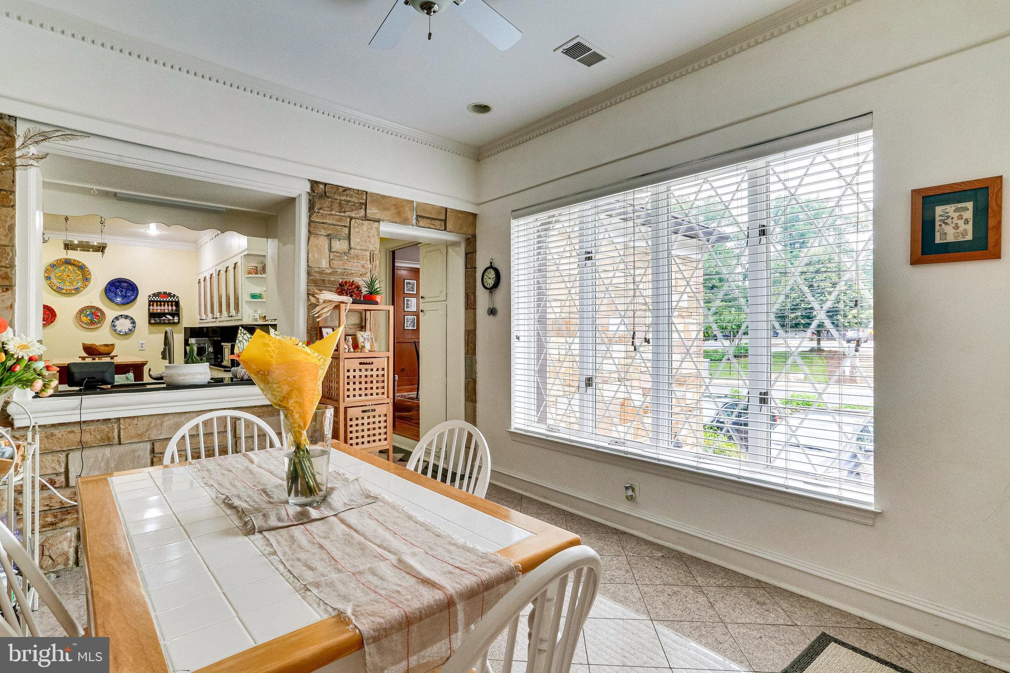 8212 Old Georgetown Road Bethesda, MD 20814 - Photo 16 of 49 Natural light pours into kitchen dining