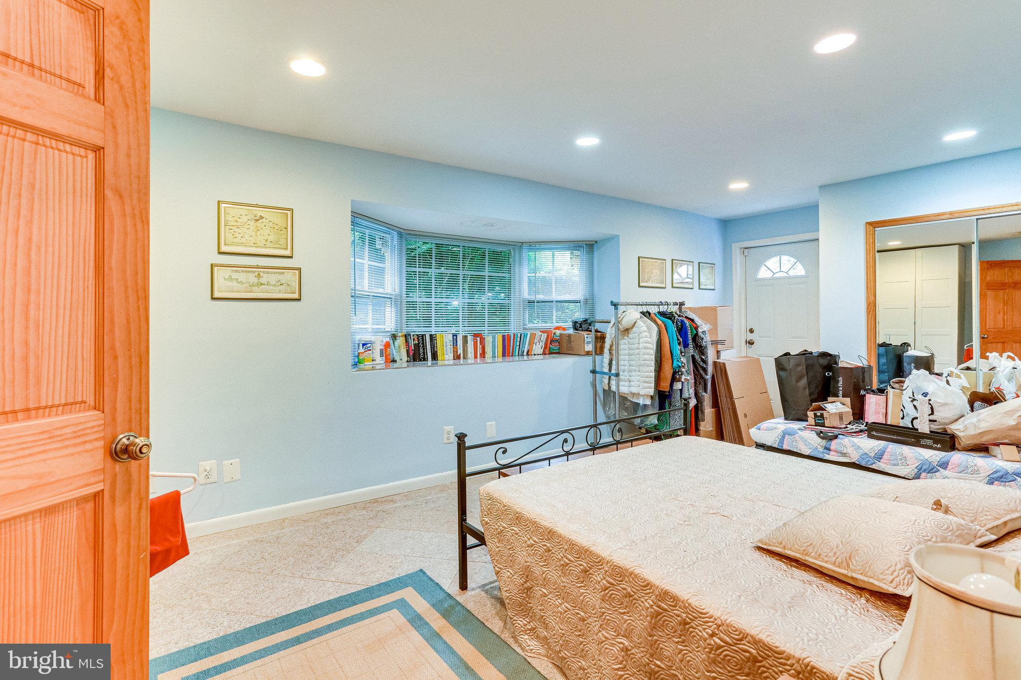 8212 Old Georgetown Road Bethesda, MD 20814 - Photo 43 of 49 lower level bedroom 2 at base of staircase