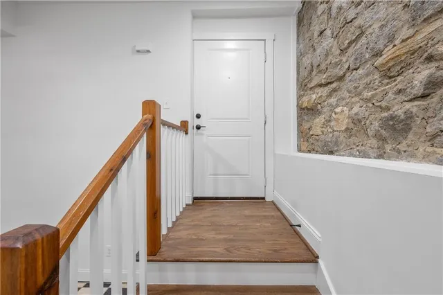 a front view of a building with a street