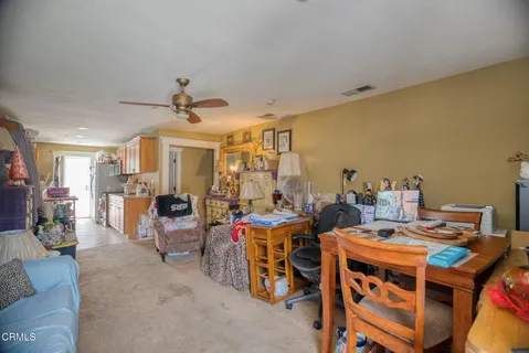 a kitchen with lots of counter top space and cabinets