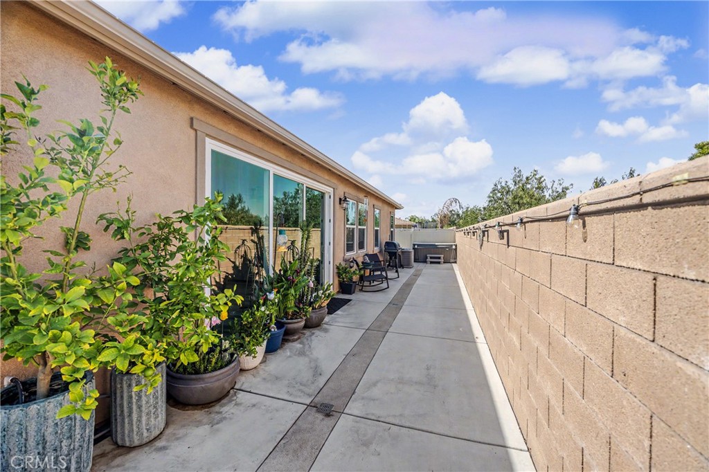 34512 Burnt Pine Road Murrieta, CA 92563 - Photo 15 of 21 a view of a house with potted plants
