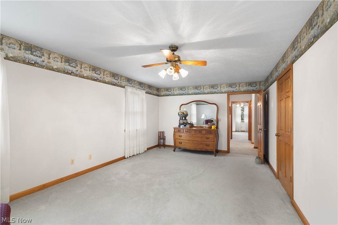 10909 Ruby Road Cambridge, OH 43725 - Photo 29 of 34 Bedroom with carpet flooring and a ceiling fan