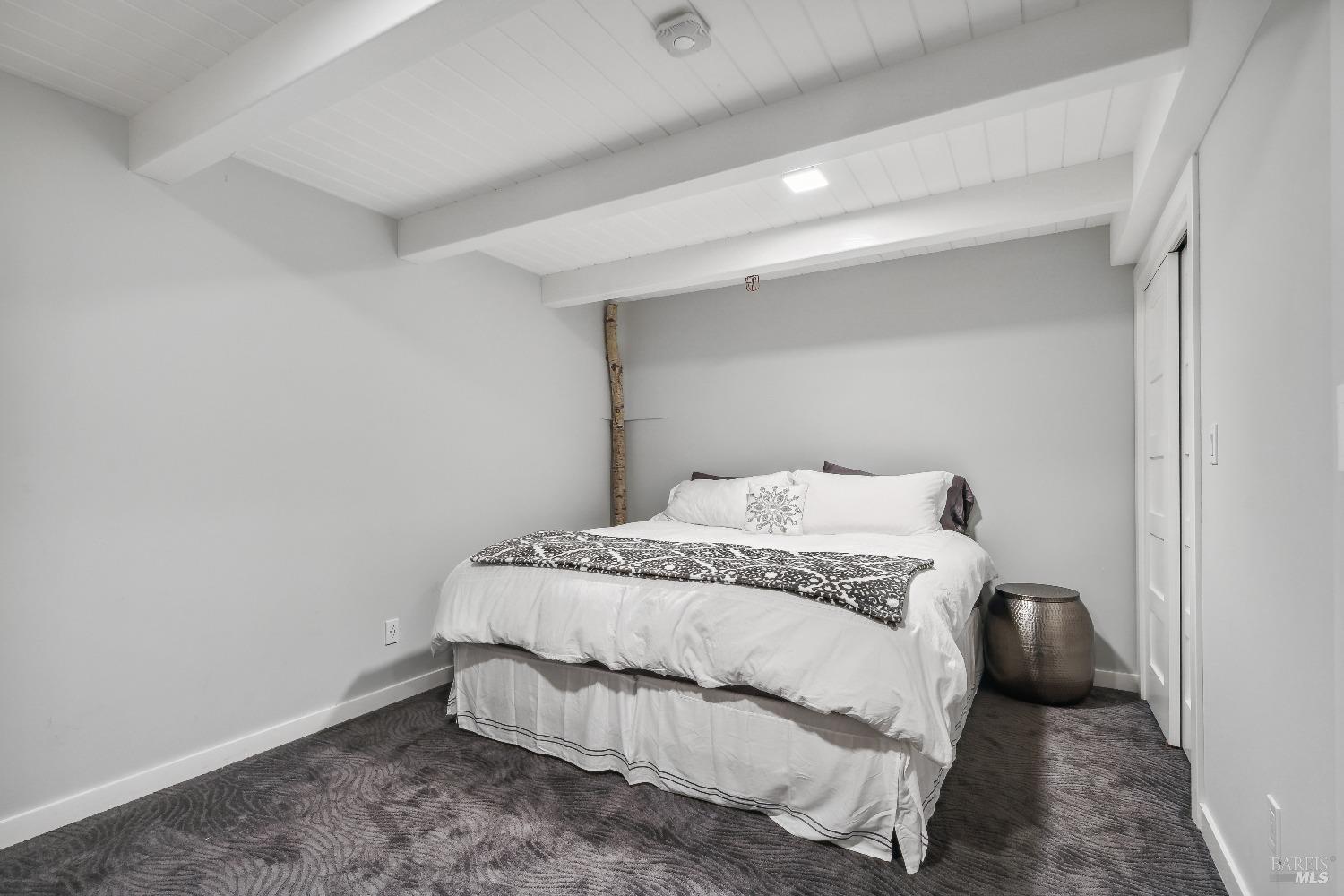 15 Gate 6 1/2 Road Mill Valley, CA 94941 - Photo 26 of 33 a bedroom with a bed and pillows