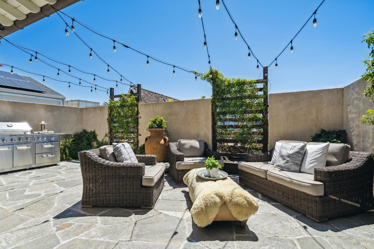15 Gate 6 1/2 Road Mill Valley, CA 94941 - Photo 3 of 33 a balcony with furniture and a potted plant