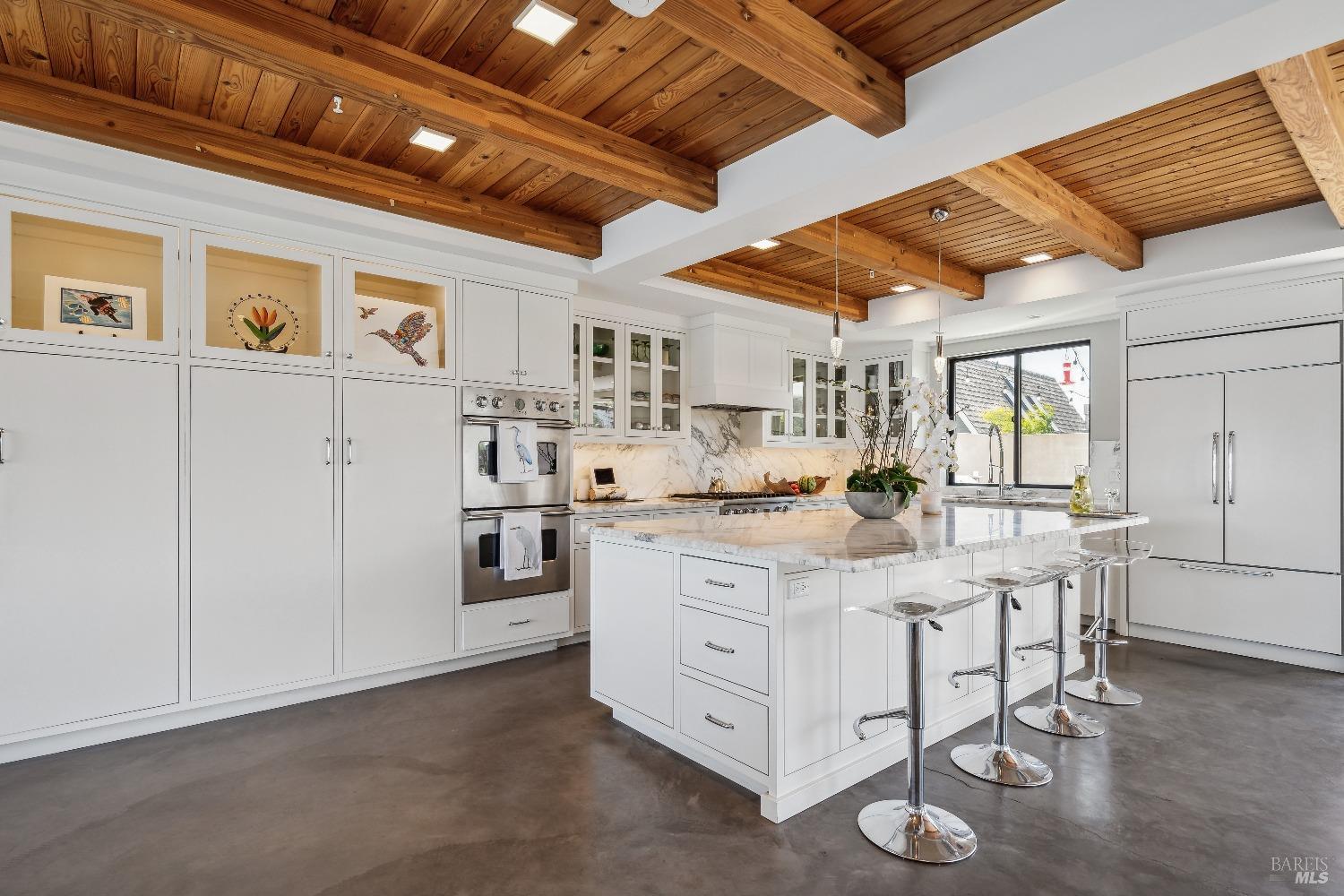 15 Gate 6 1/2 Road Mill Valley, CA 94941 - Photo 5 of 33 a kitchen with stainless steel appliances granite countertop a white cabinets and wooden floor