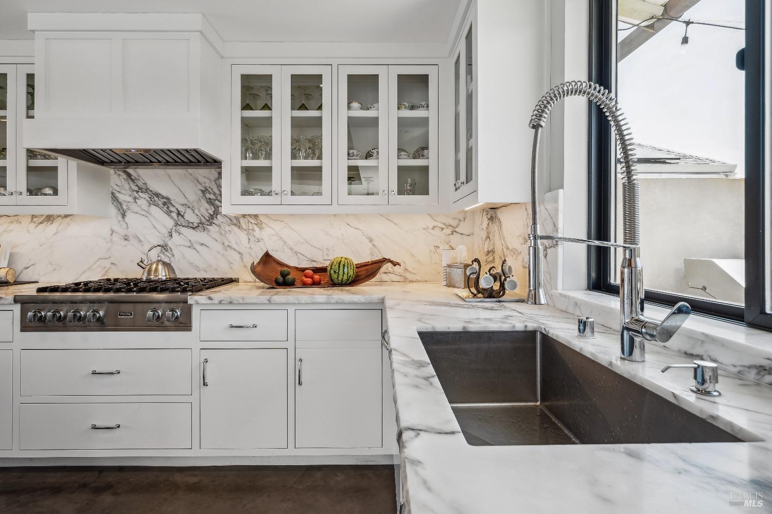 15 Gate 6 1/2 Road Mill Valley, CA 94941 - Photo 7 of 33 a kitchen with stainless steel appliances a sink stove and cabinets