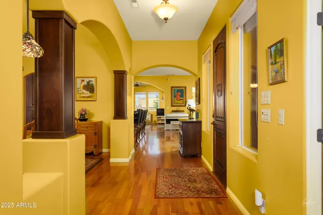 a spacious bathroom with a granite countertop tub sink and mirror