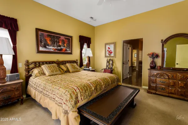 a bathroom with a tub sink and a mirror