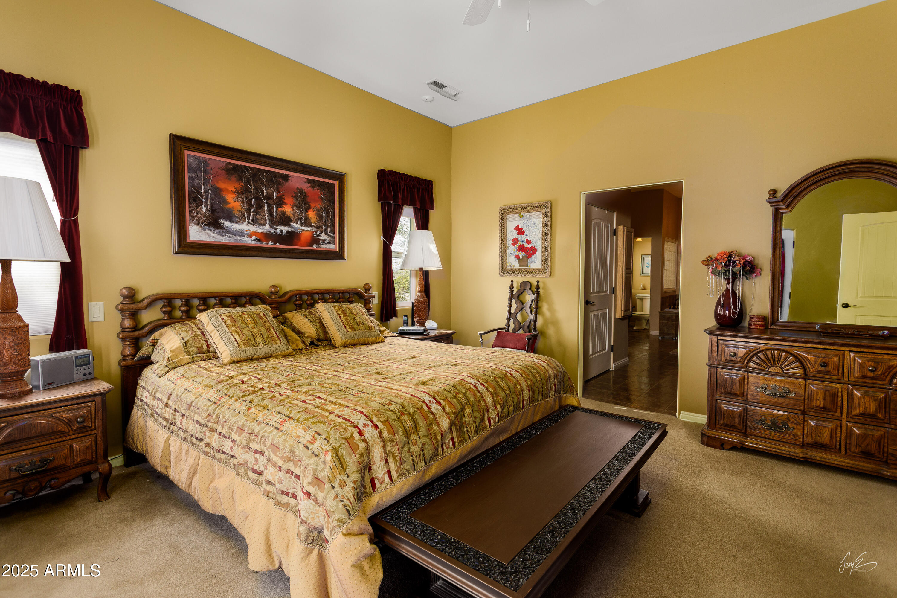 2601 South Frehner Road Littlefield, AZ 86432 - Photo 17 of 32 a bedroom with bed and a chandelier