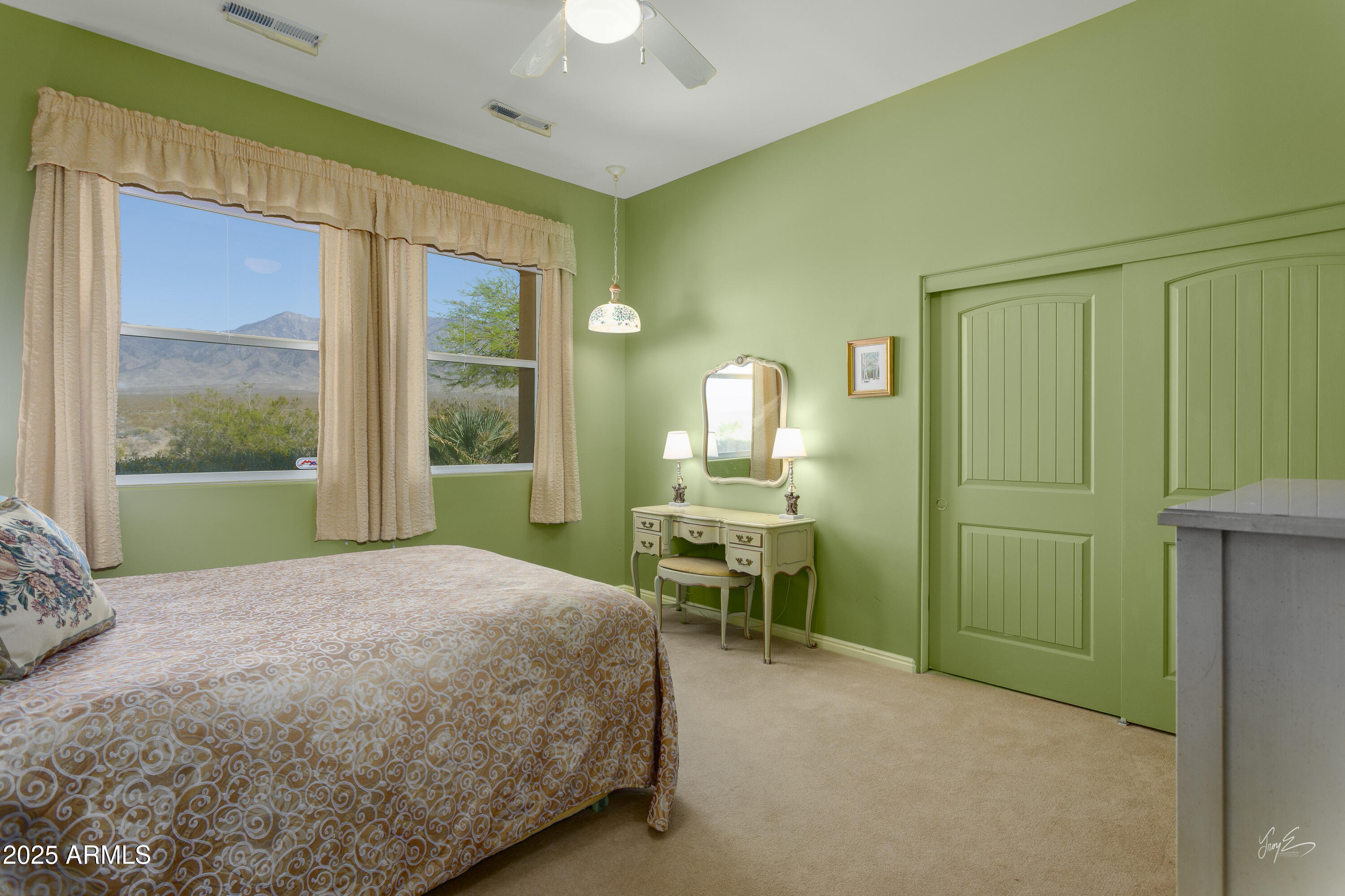 2601 South Frehner Road Littlefield, AZ 86432 - Photo 20 of 32 a bed room with a bed and a window