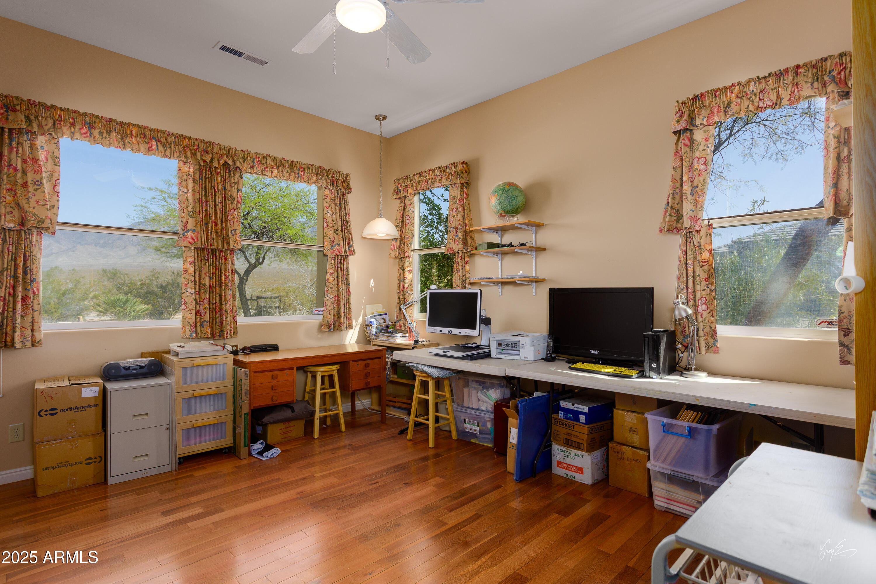 2601 South Frehner Road Littlefield, AZ 86432 - Photo 22 of 32 a view of a workspace with furniture and a window