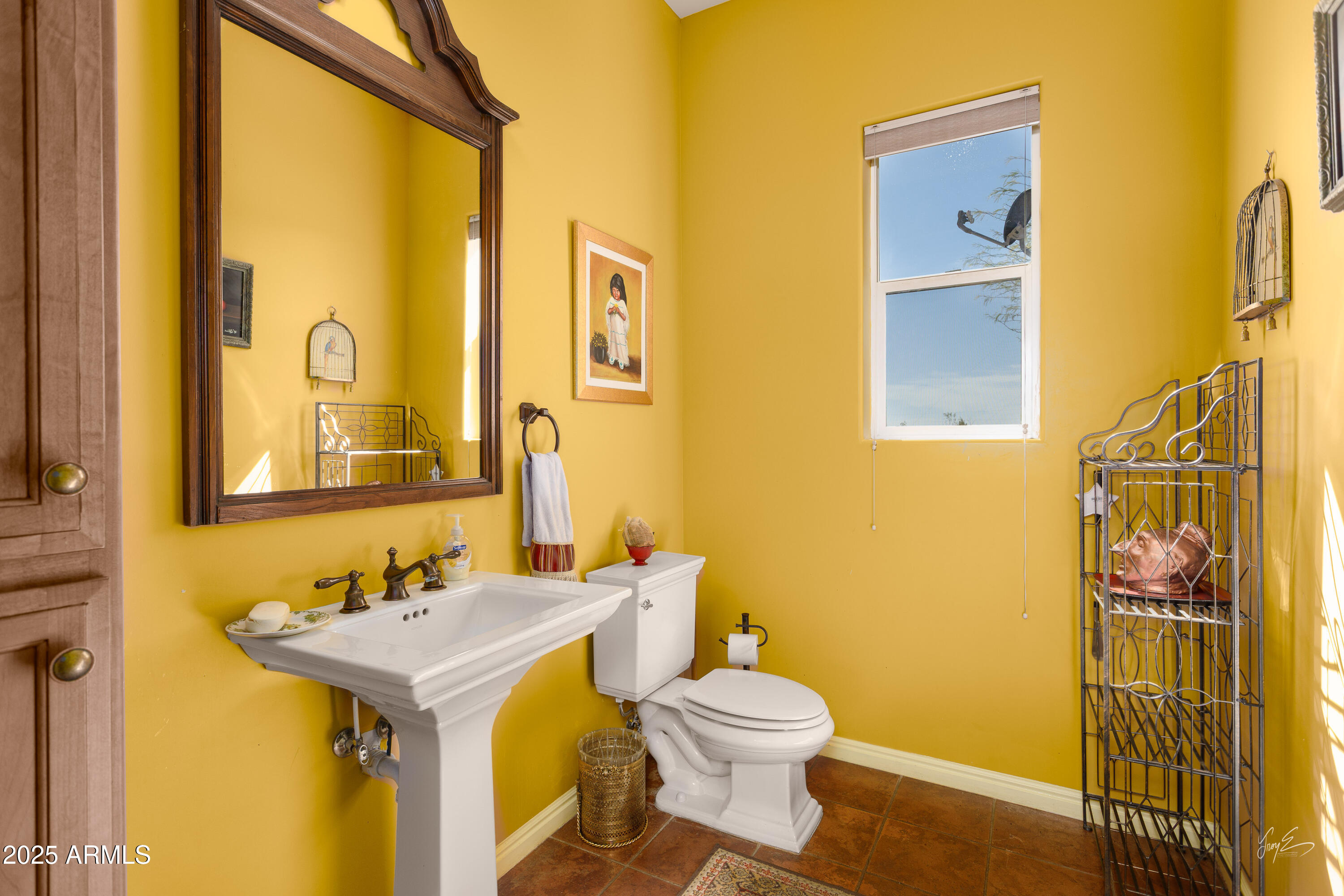 2601 South Frehner Road Littlefield, AZ 86432 - Photo 23 of 32 a bathroom with a sink and a mirror