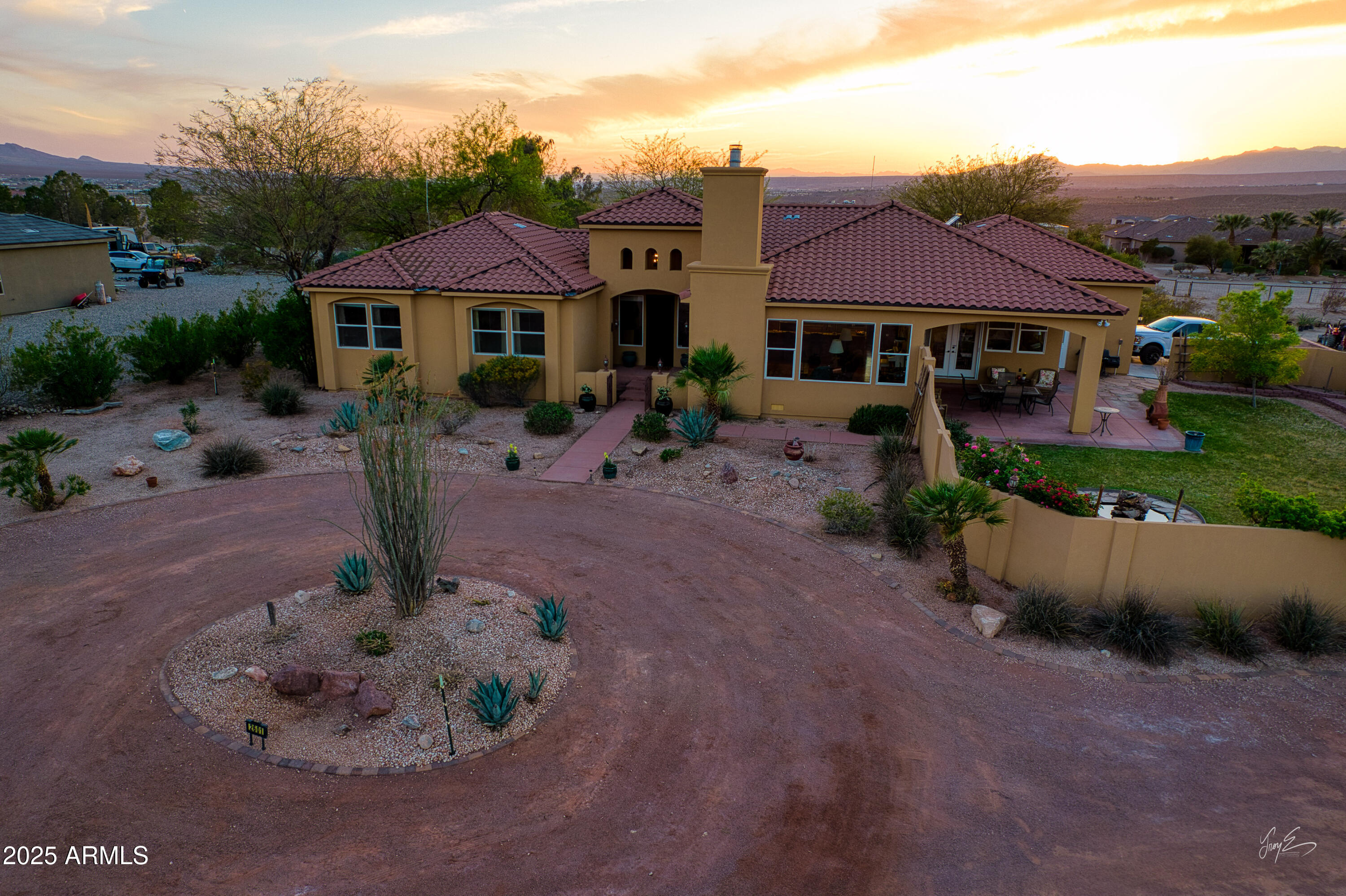 2601 South Frehner Road Littlefield, AZ 86432 - Photo 27 of 32 a front view of house with yard and trees in the background