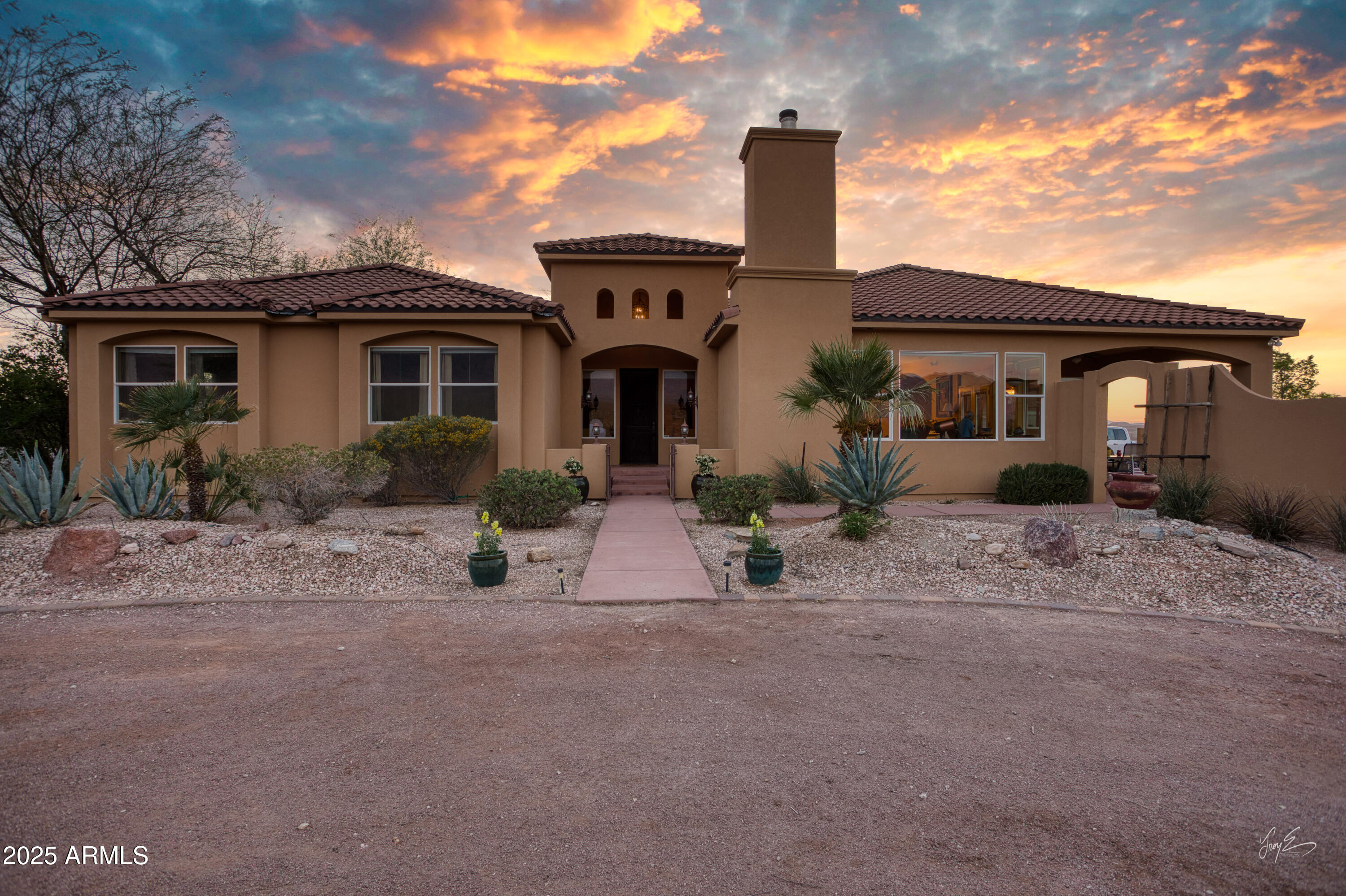 2601 South Frehner Road Littlefield, AZ 86432 - Photo 28 of 32 a front view of a house with garden