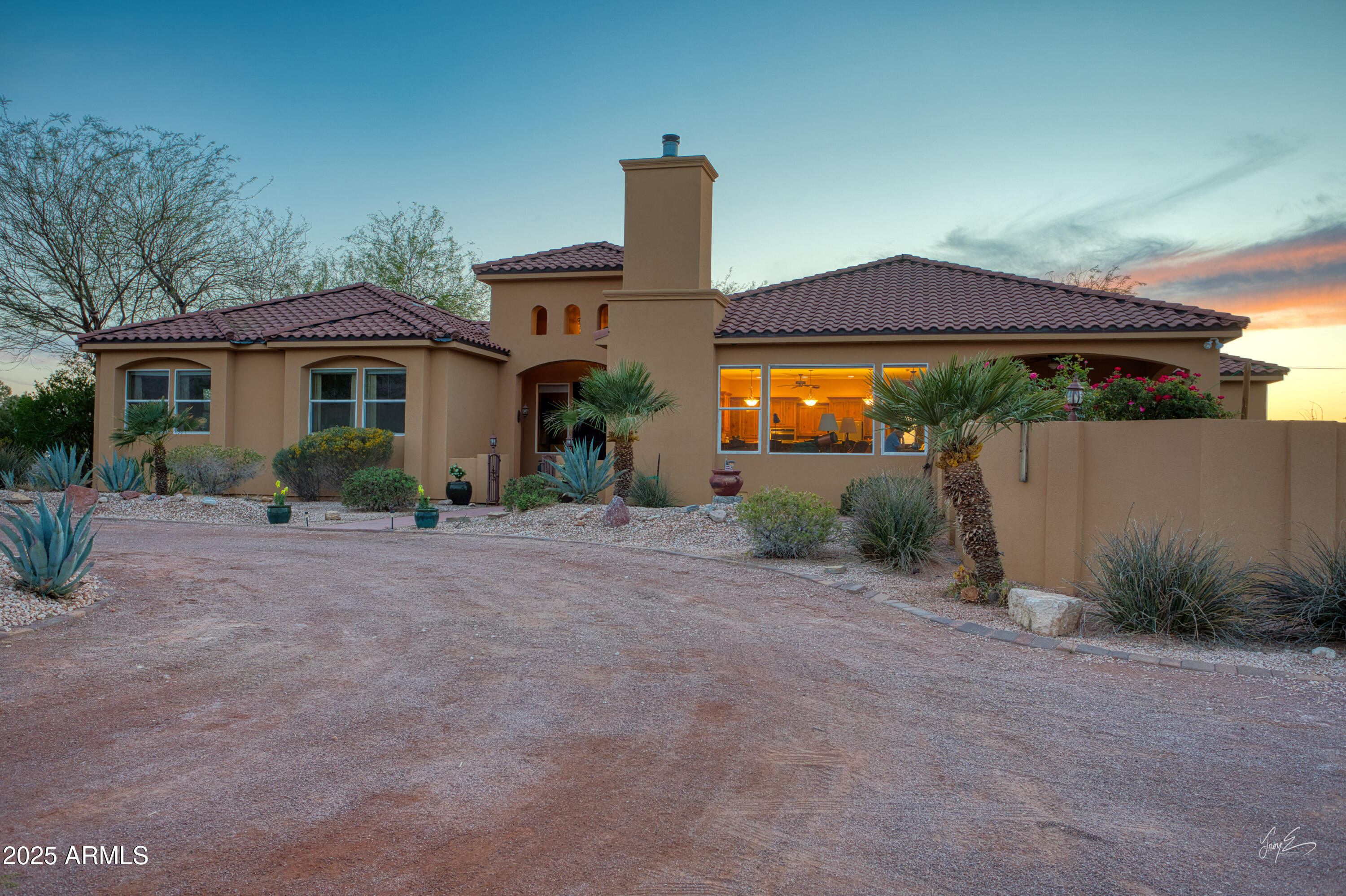 2601 South Frehner Road Littlefield, AZ 86432 - Photo 29 of 32 a front view of a house with garden