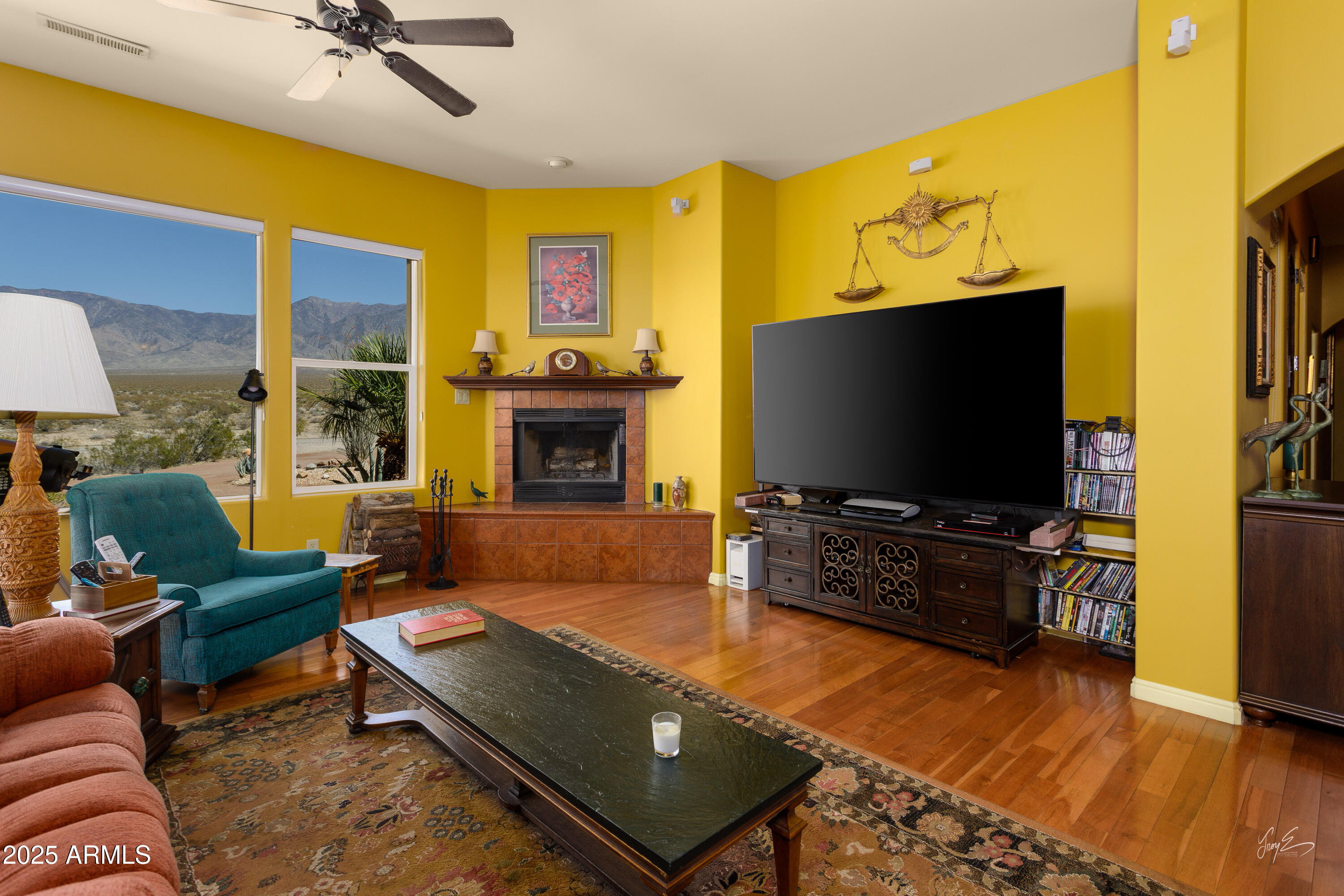 2601 South Frehner Road Littlefield, AZ 86432 - Photo 6 of 32 a living room with furniture and a flat screen tv