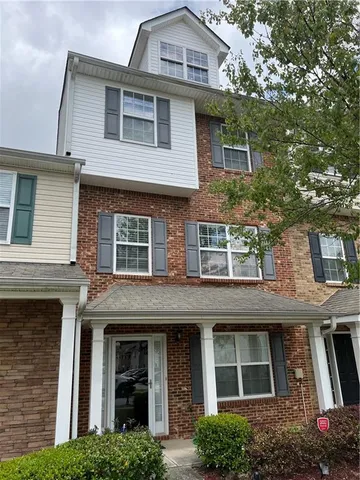 a view of room with wooden floor