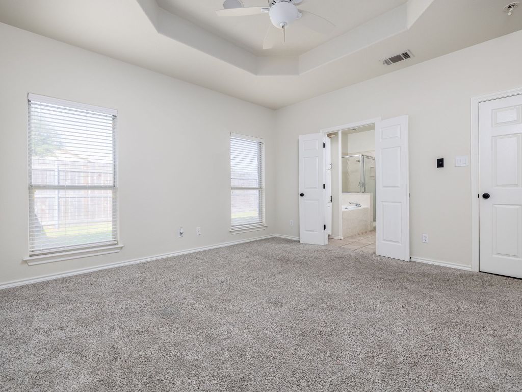 2209 Lark Lane Taylor, TX 76574 - Photo 17 of 25 a view of an empty room with a window