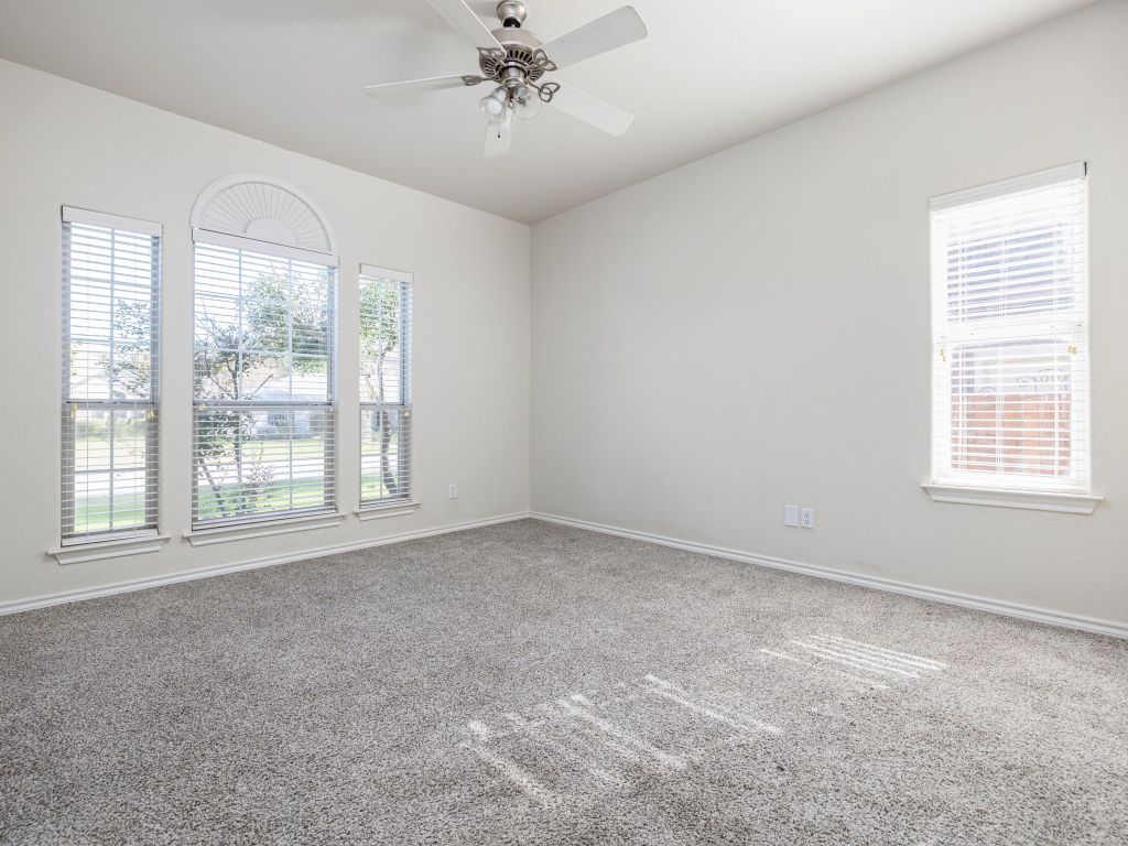 2209 Lark Lane Taylor, TX 76574 - Photo 21 of 25 a view of an empty room with a window