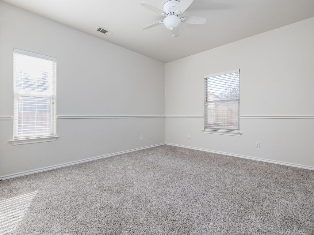 2209 Lark Lane Taylor, TX 76574 - Photo 23 of 25 an empty room with a window