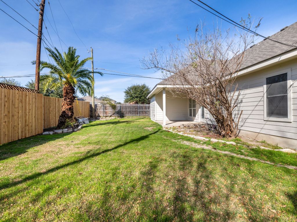 2209 Lark Lane Taylor, TX 76574 - Photo 8 of 25 a view of a yard with a house