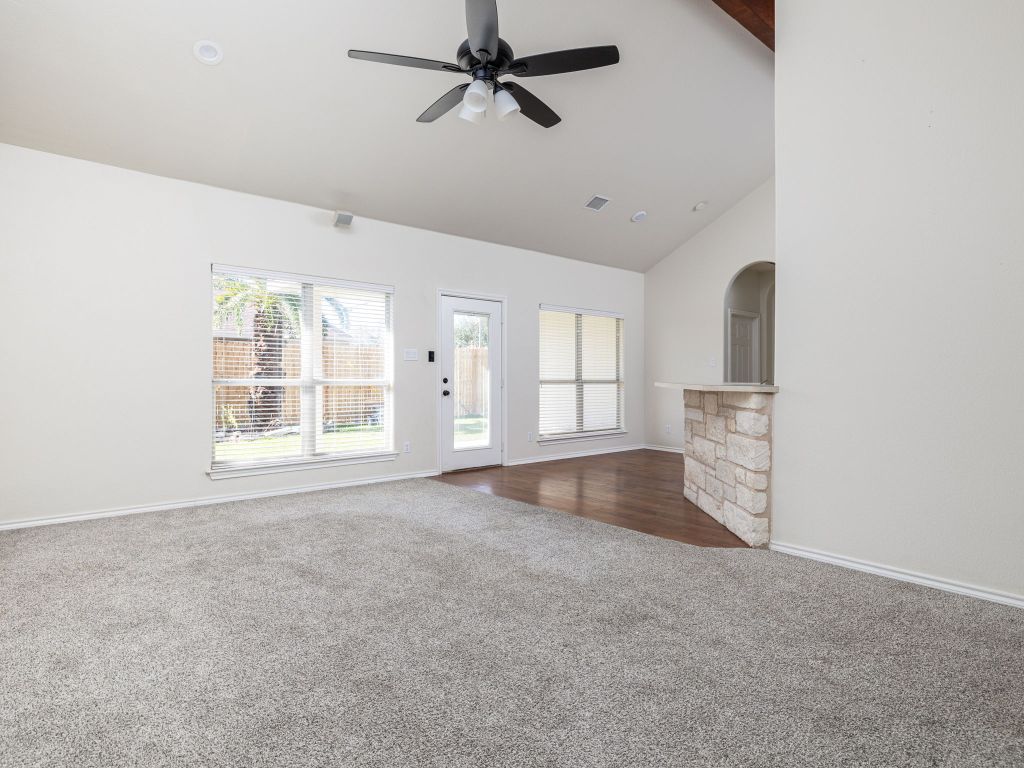 2209 Lark Lane Taylor, TX 76574 - Photo 10 of 25 an empty room with windows and closet