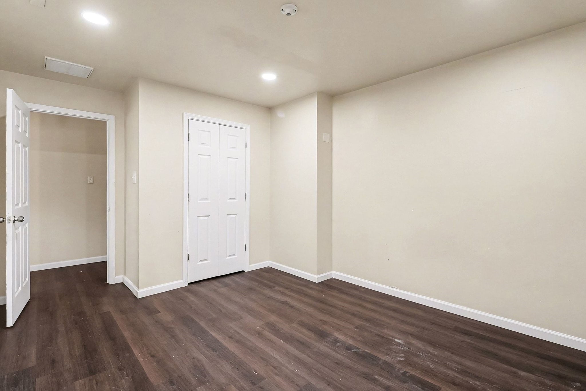 8138 Constellation Lane Houston, TX 77075 - Photo 9 of 16 a view of an empty room with wooden floor