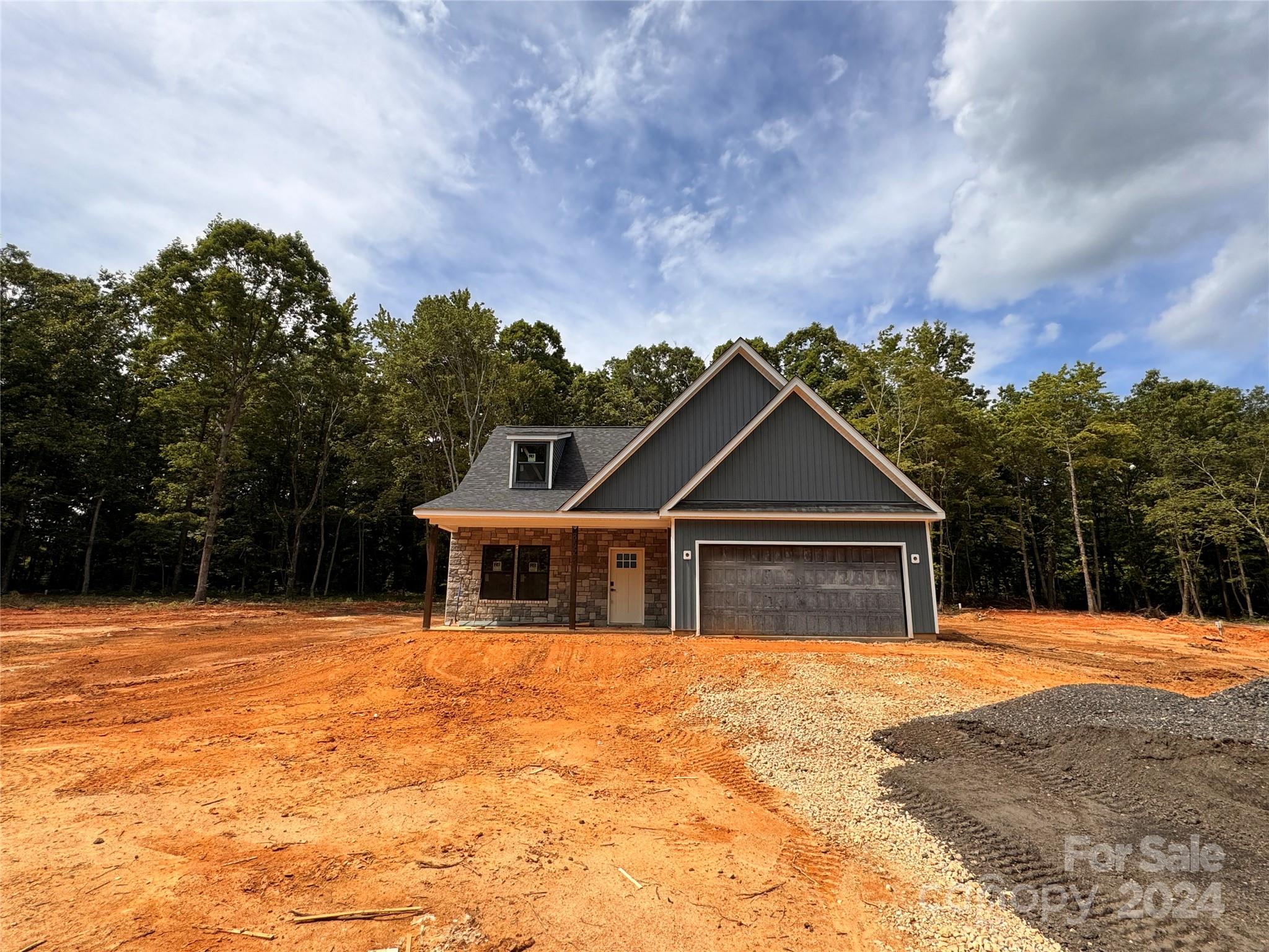 8560 Castor Road Salisbury, NC 28146 - Photo 2 of 13 a house with trees in the background