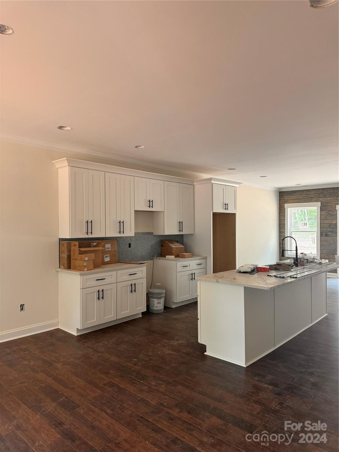 8560 Castor Road Salisbury, NC 28146 - Photo 4 of 13 a large kitchen with cabinets wooden floor and stainless steel appliances