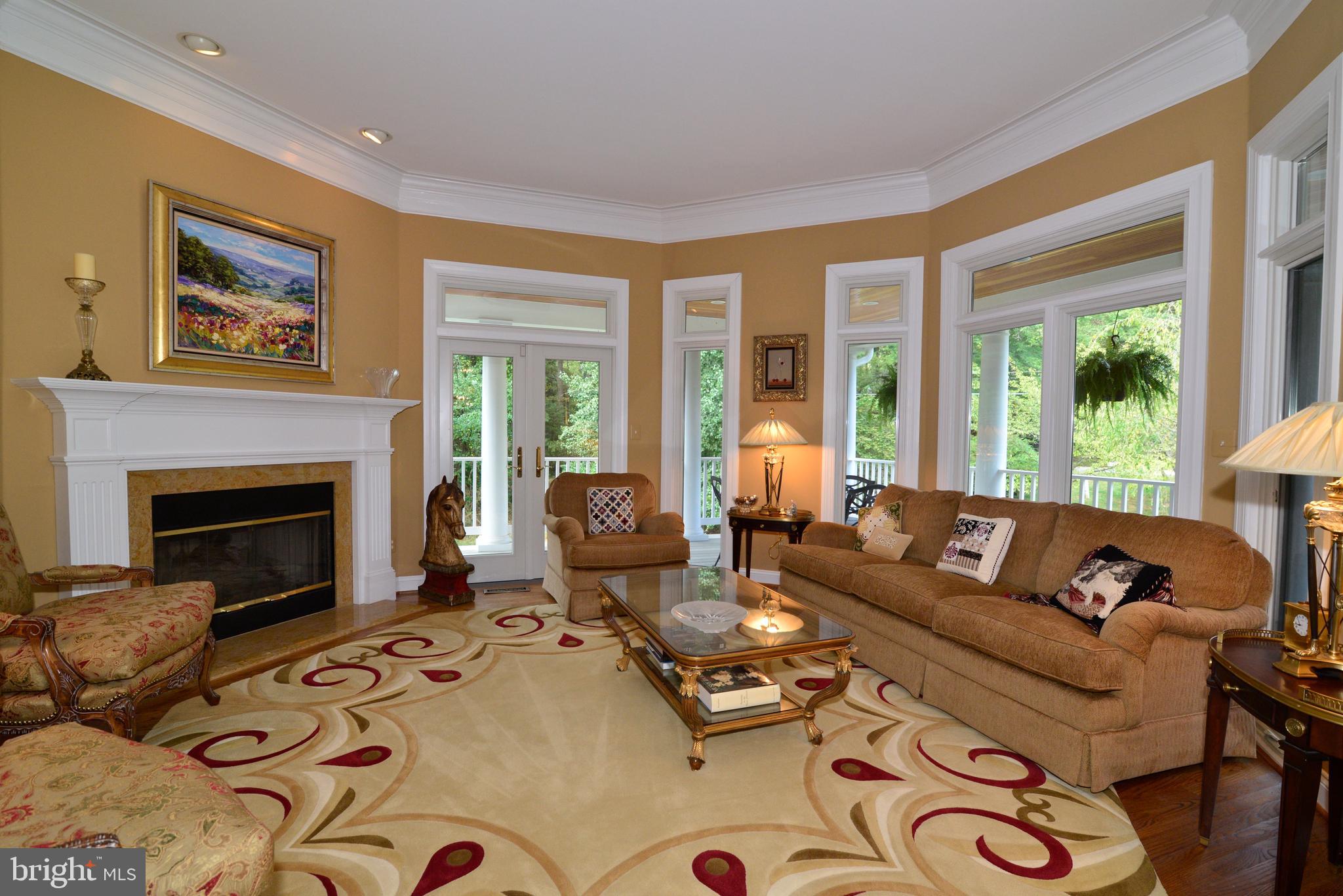 10507 Wickens Road Vienna, VA 22181 - Photo 10 of 59 Intimate Octagonal Living Room w/Walls of Windows.