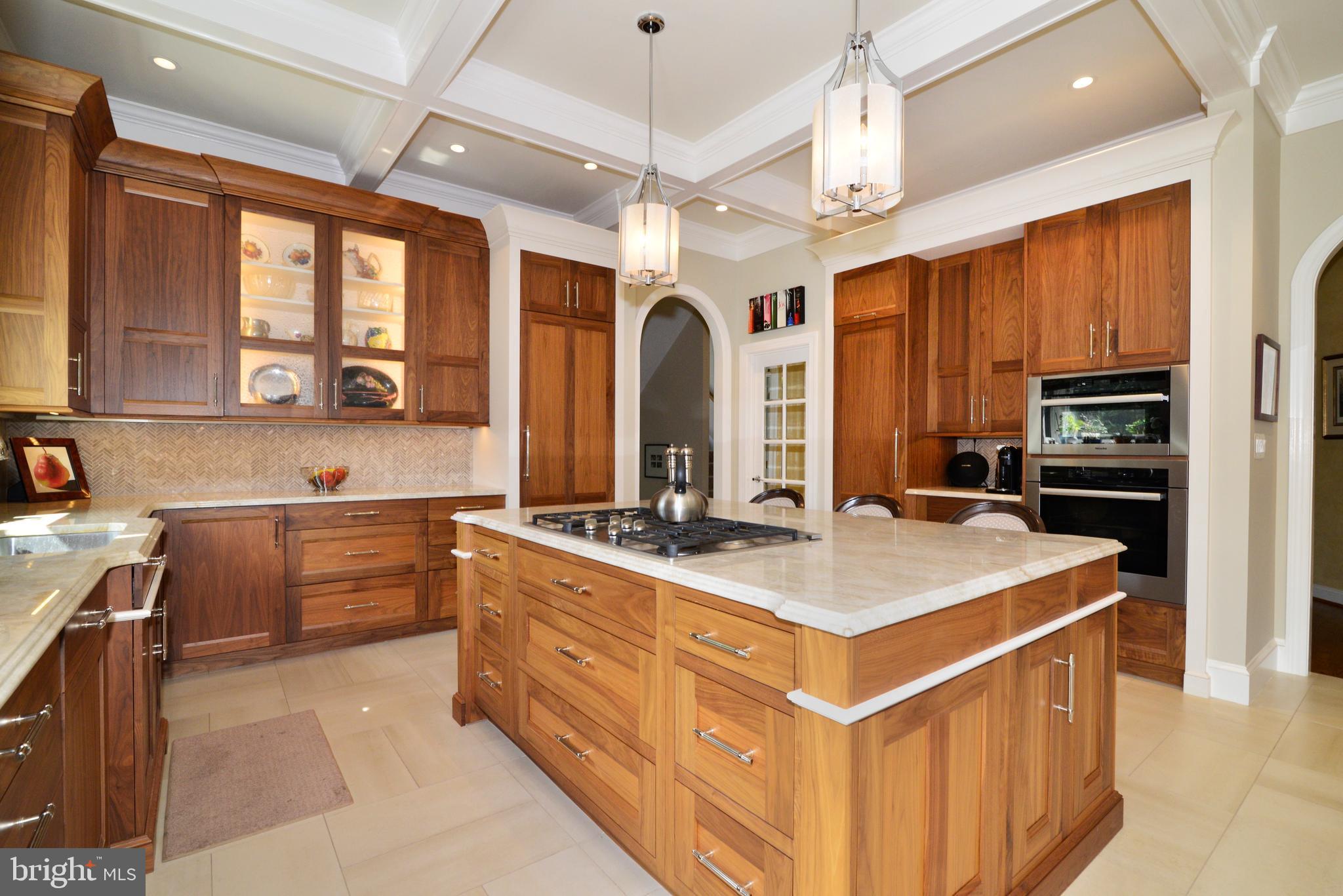 10507 Wickens Road Vienna, VA 22181 - Photo 17 of 59 Walnut Cabinetry, SubZero and Miele Appliances.