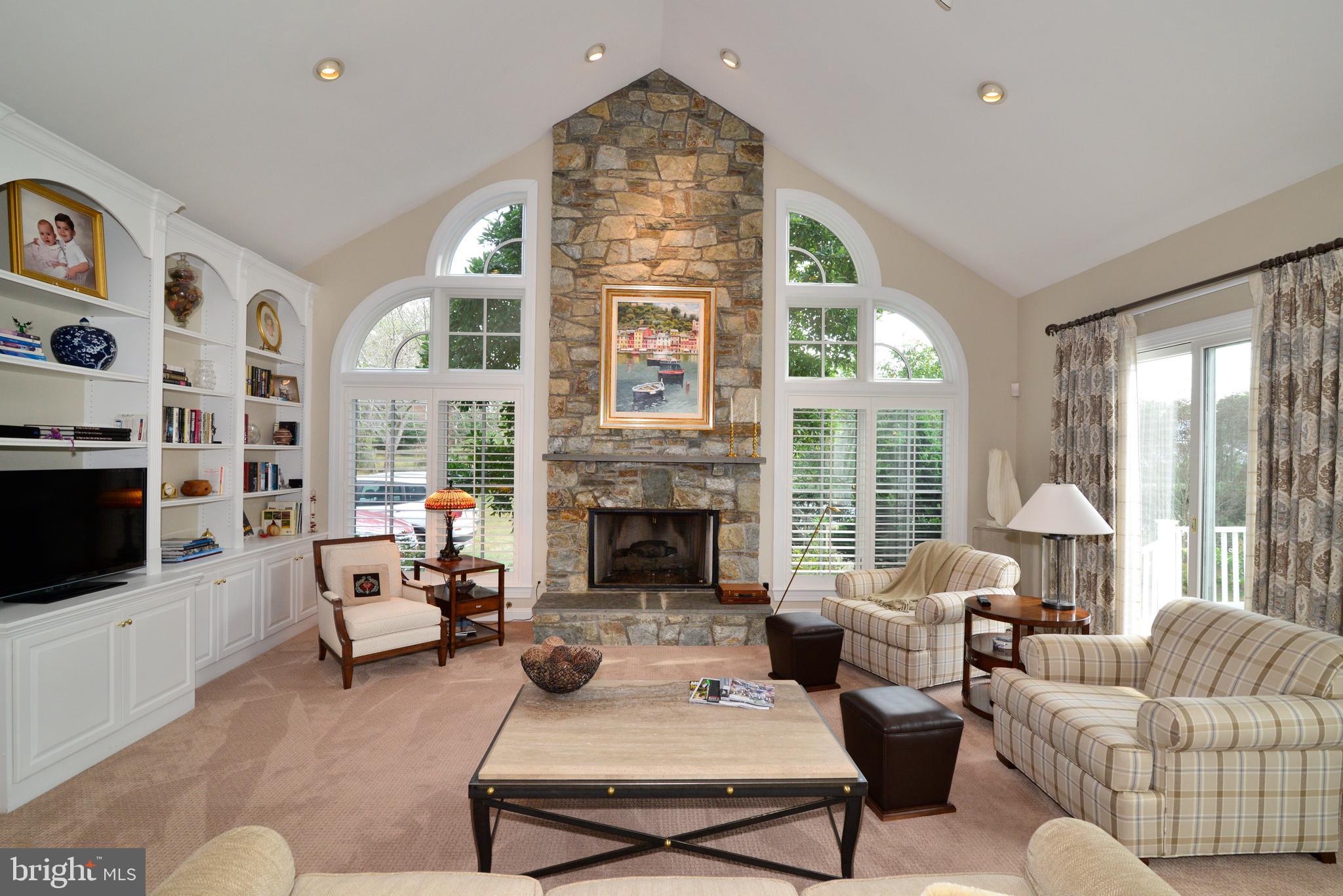 10507 Wickens Road Vienna, VA 22181 - Photo 20 of 59 Floor to Ceiling Stone Gas Fireplace.