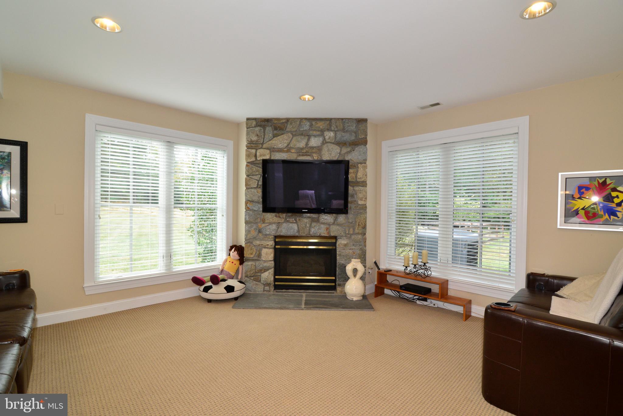 10507 Wickens Road Vienna, VA 22181 - Photo 39 of 59 Light & Bright Lower Level W/O w/Gas Fireplace.