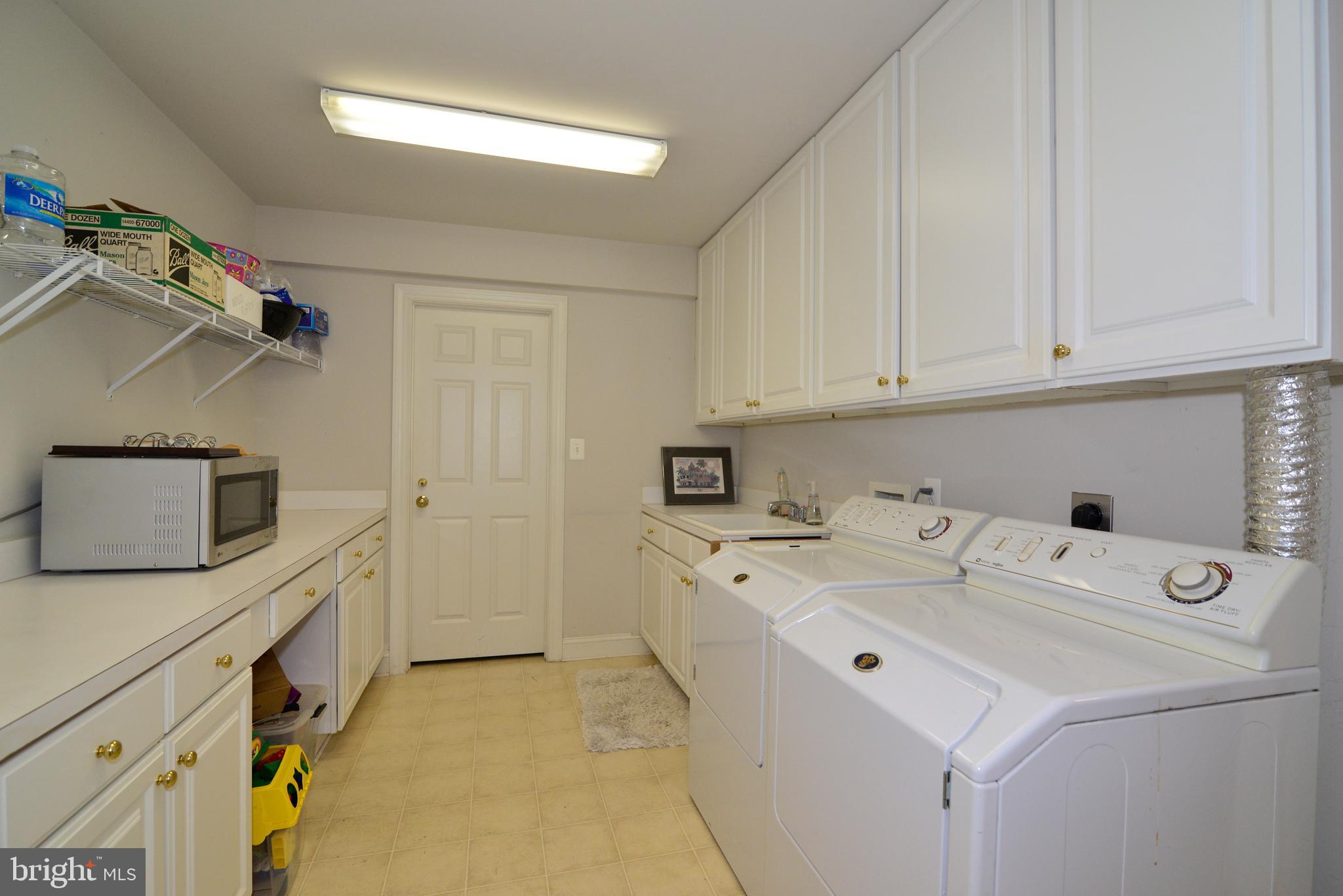 10507 Wickens Road Vienna, VA 22181 - Photo 47 of 59 Lower Level Laundry/Catering Area/Storage.