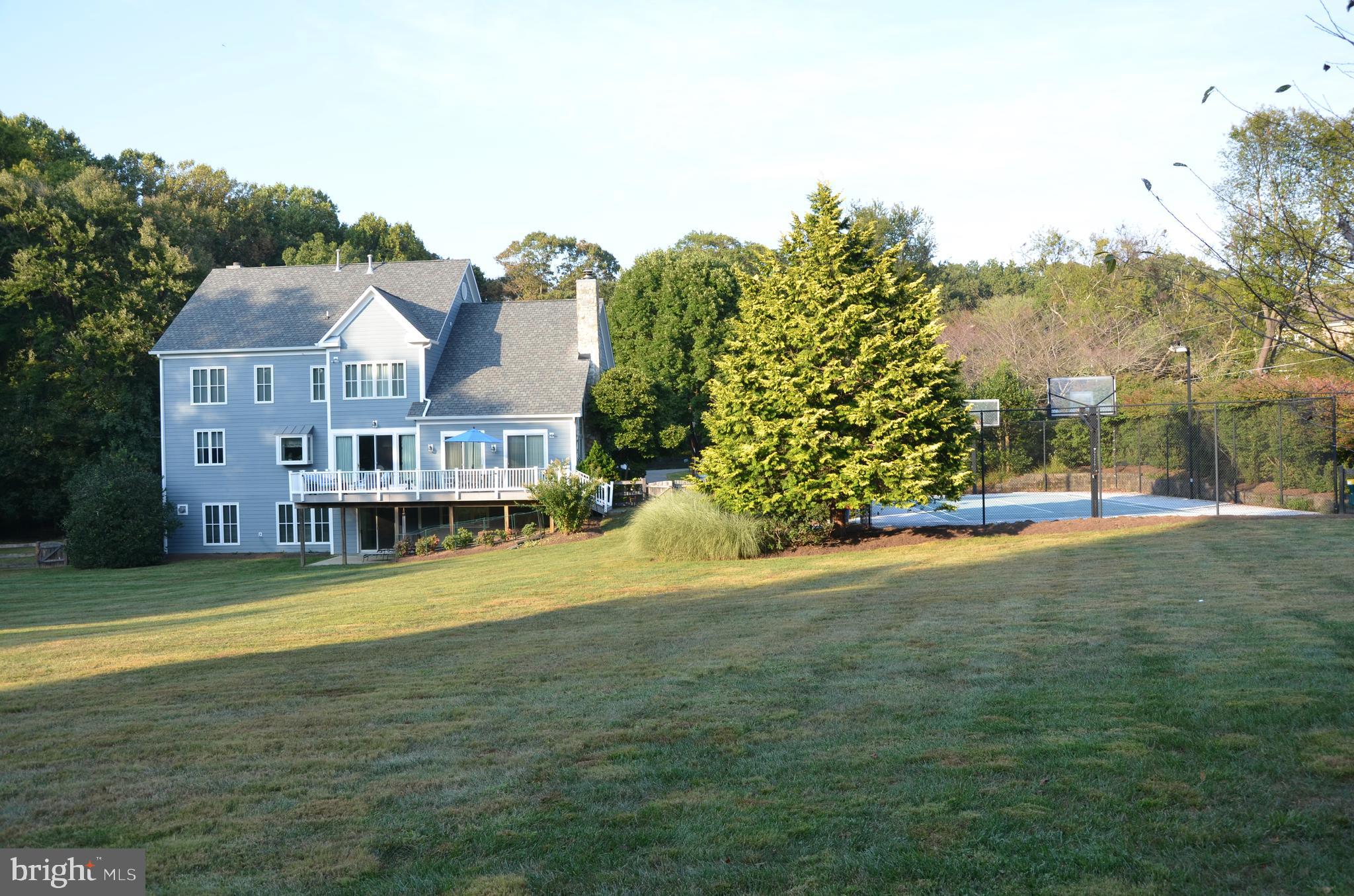 10507 Wickens Road Vienna, VA 22181 - Photo 57 of 59 View to Back of Home and Lighted Sport Court.