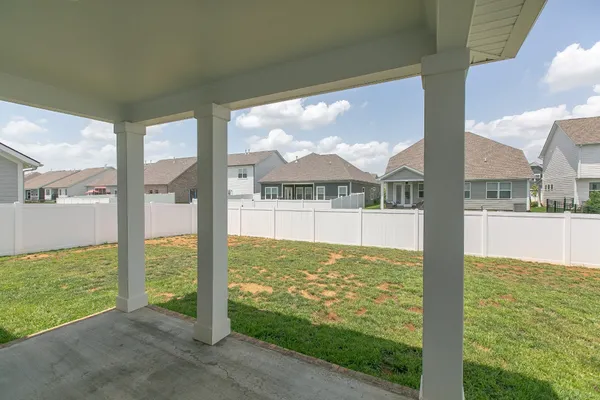 a view of a large window with an outdoor space