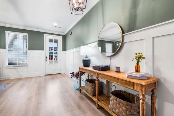 a room with furniture and flowerpot