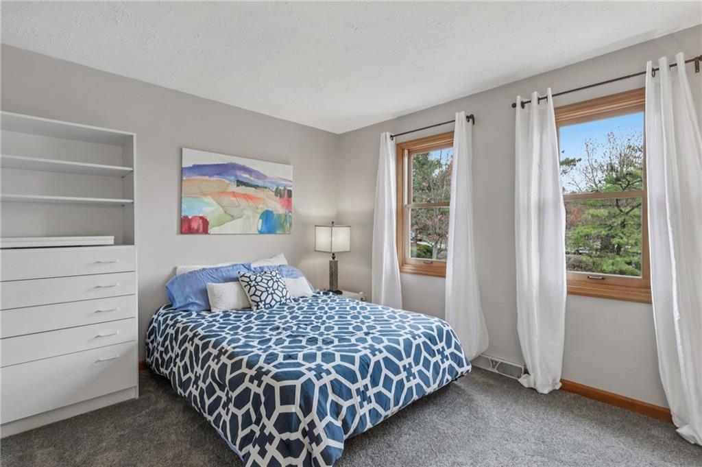 416 Chandler Place Pittsburgh, PA 15212 - Photo 25 of 38 a bedroom with a bed and a window