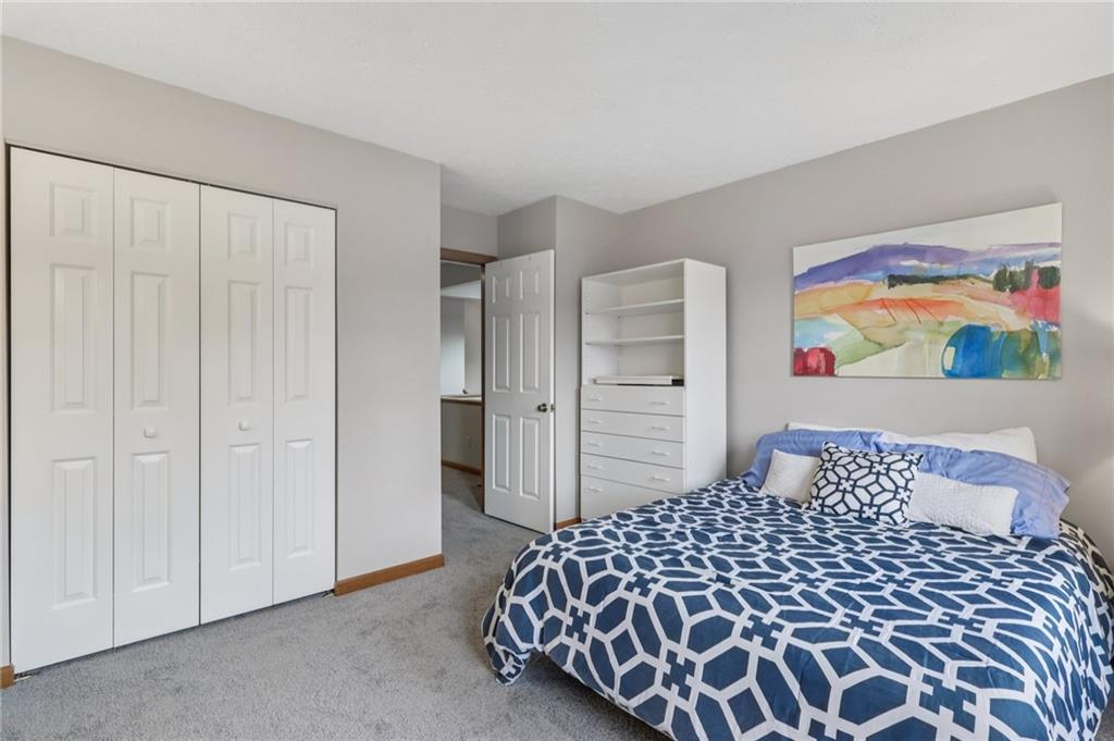 416 Chandler Place Pittsburgh, PA 15212 - Photo 26 of 38 a bedroom with a bed and painting on the wall