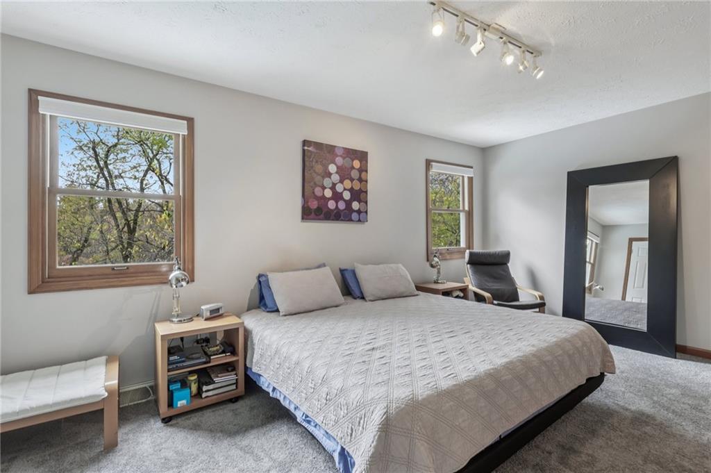 416 Chandler Place Pittsburgh, PA 15212 - Photo 29 of 38 a bedroom with a bed and a couch