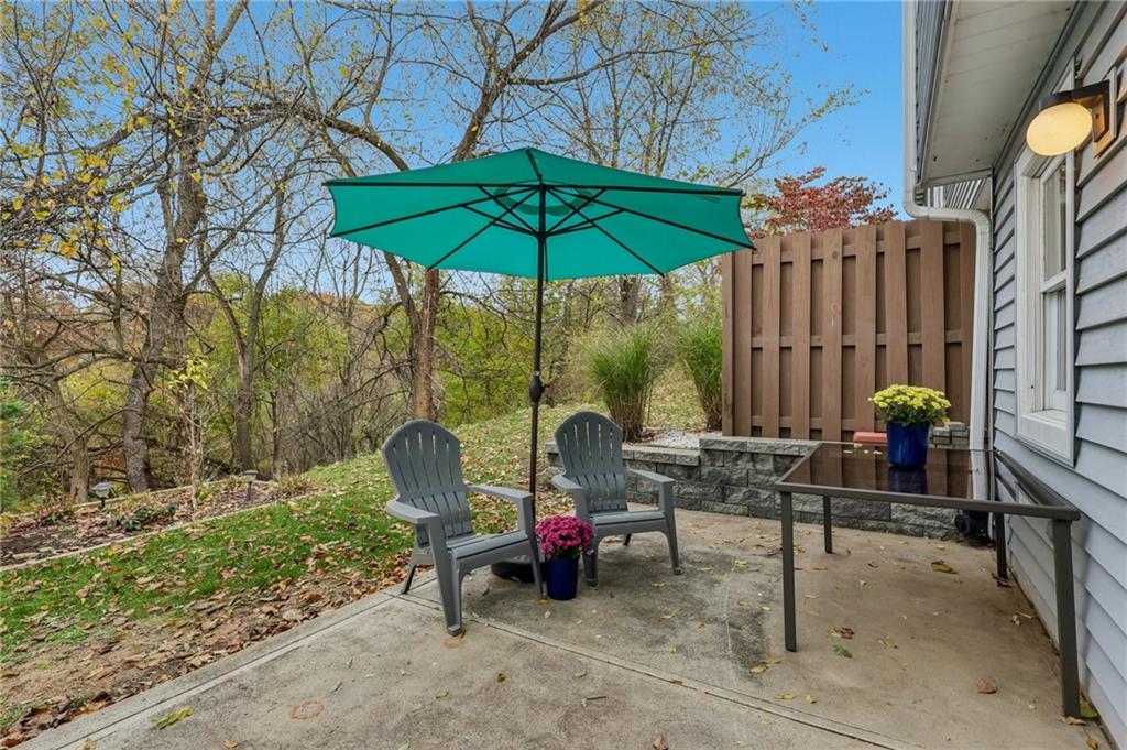 416 Chandler Place Pittsburgh, PA 15212 - Photo 35 of 38 a view of a two chairs under an umbrella in the patio